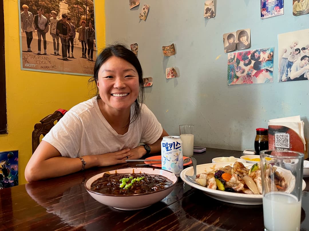 Courtney sitting at a Korean restaurant in Santiago